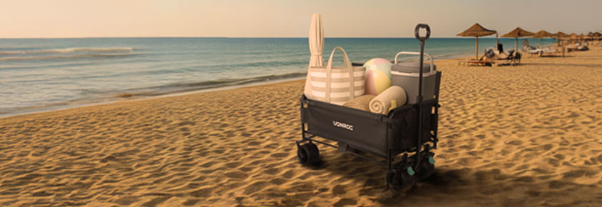 Kompaktowy wózek ręczny Vonroc na plaży